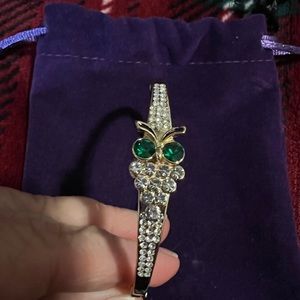Owl bracelet with diamond and emerald like stones! Very pretty!
